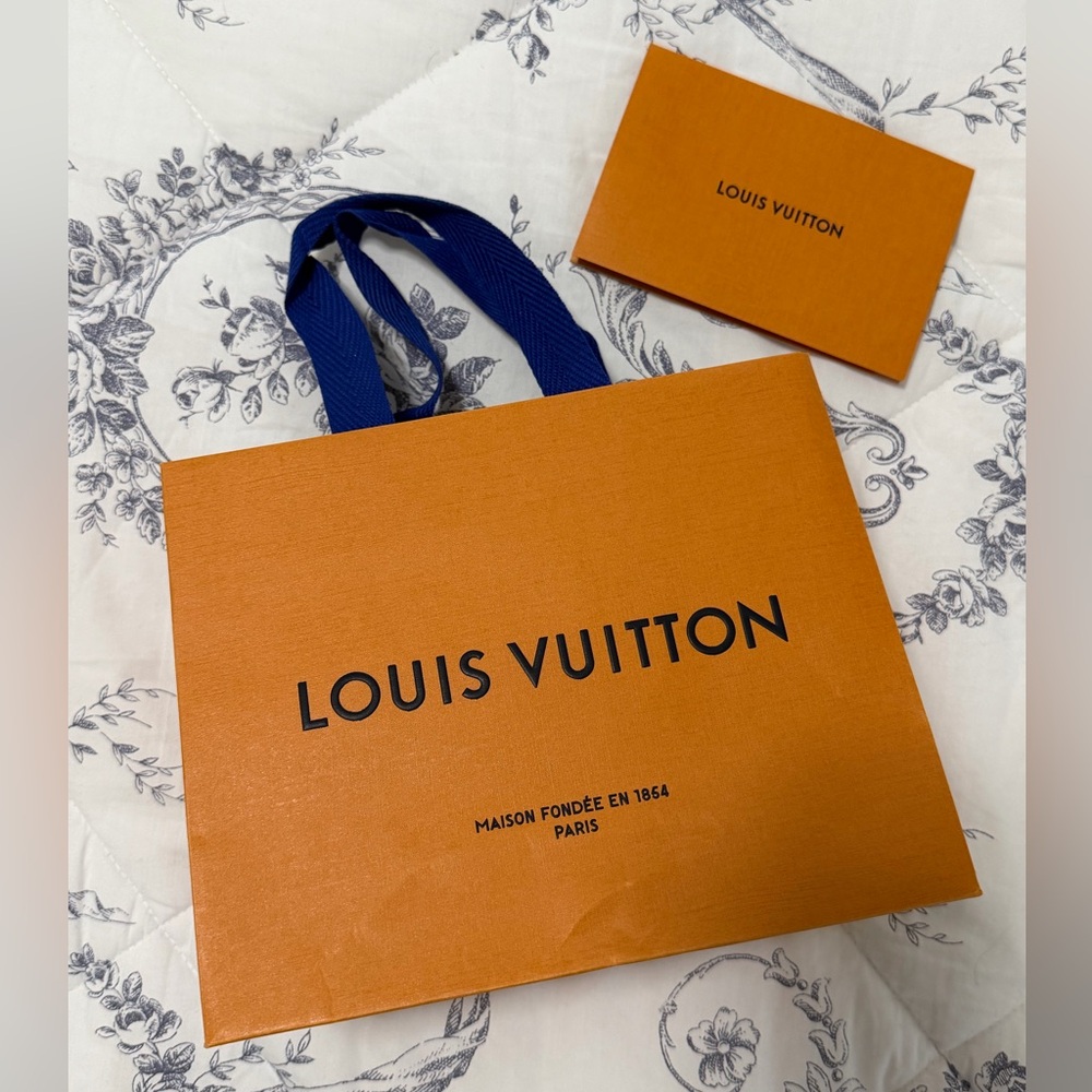 Louis Vuitton Bold Orange Bag with Blue Handles